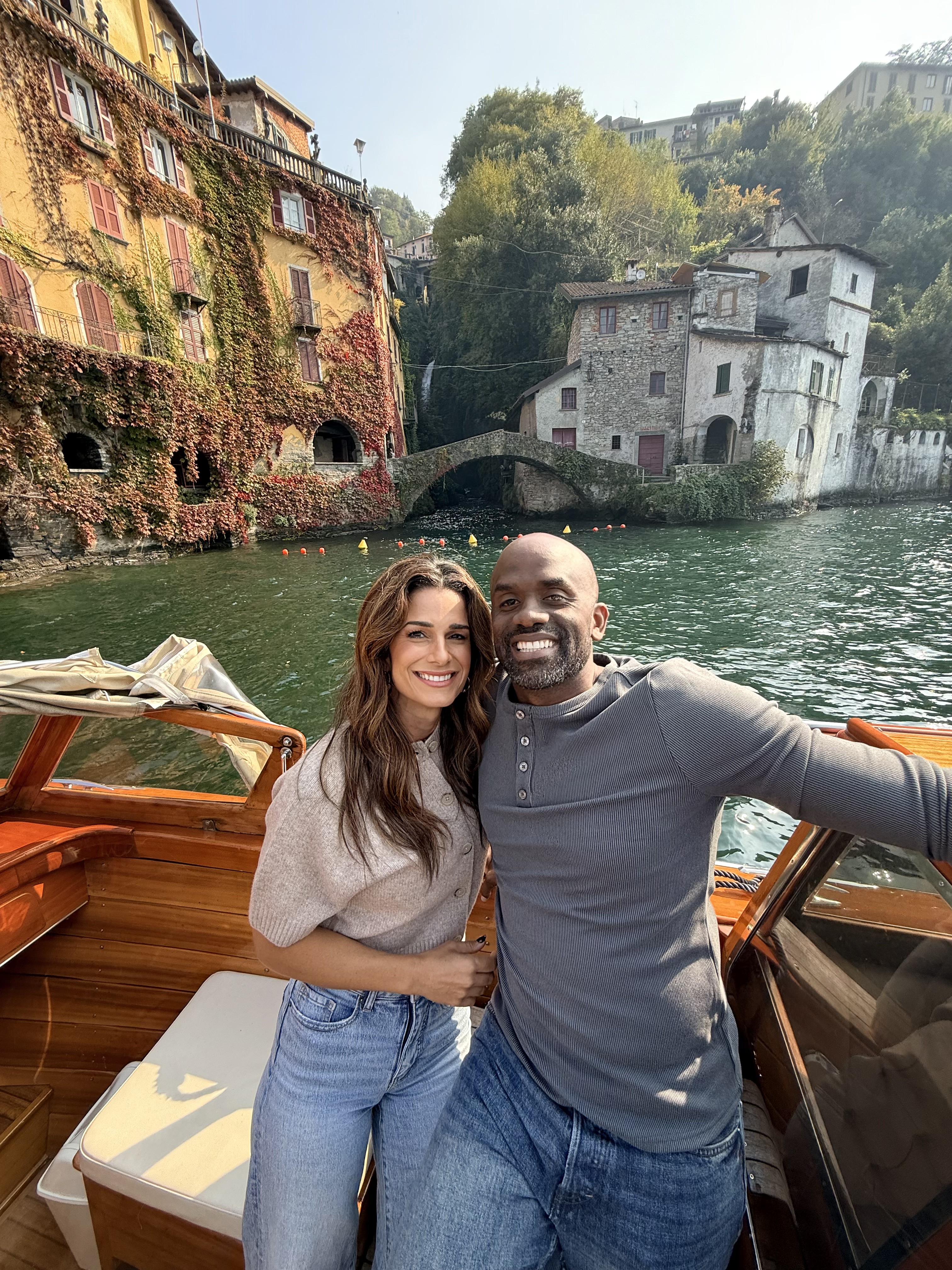 Sherman & Cristina enjoying a boat ride in Italy — the life Money Dates helped build